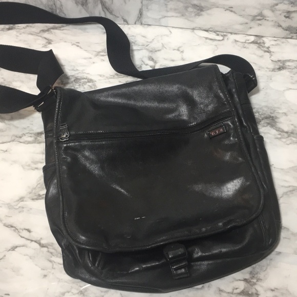 tumi leather messenger bag